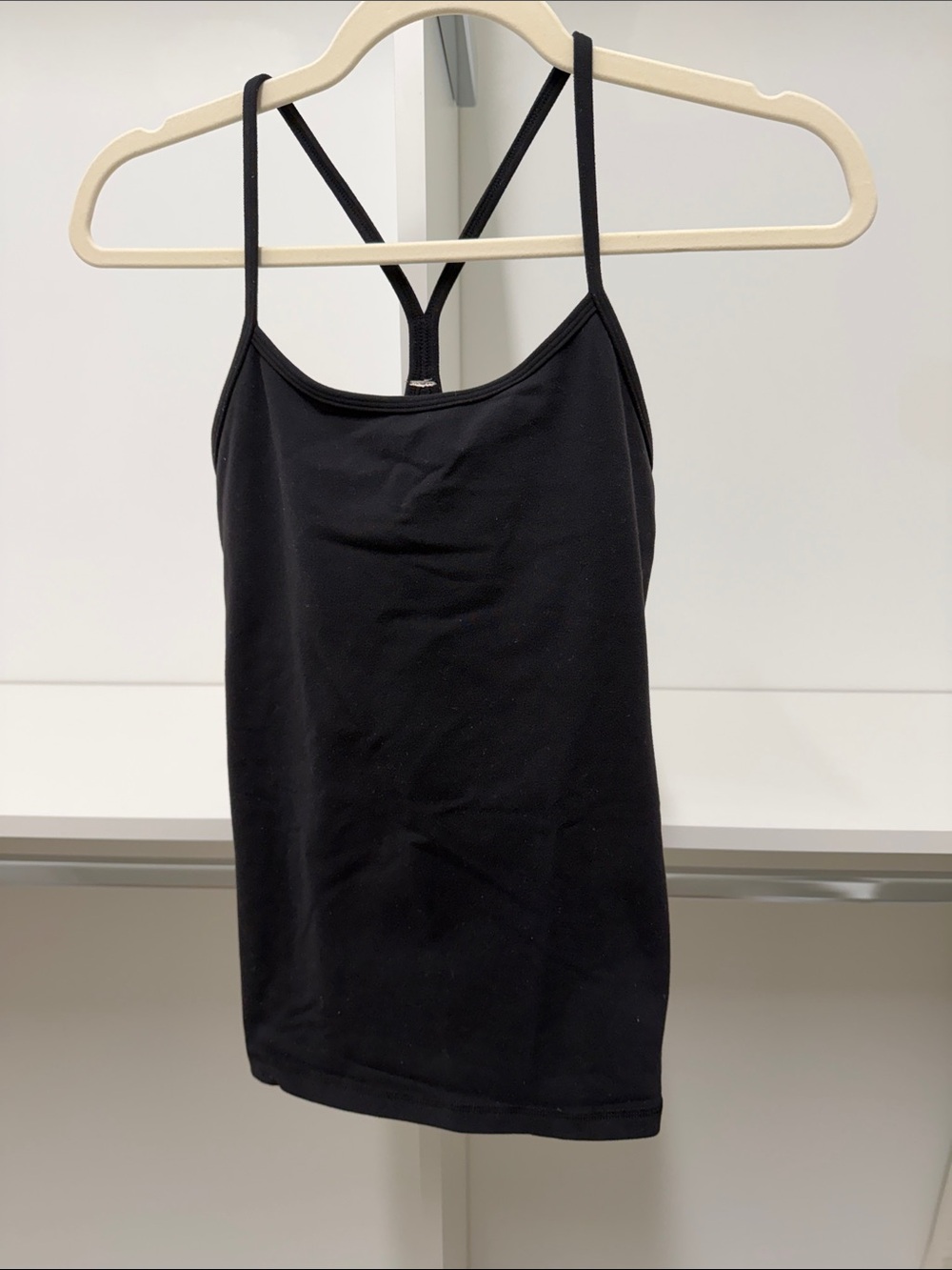 Lululemon Black Power Y size 6 tank. Good condition. Very minimal pilling.